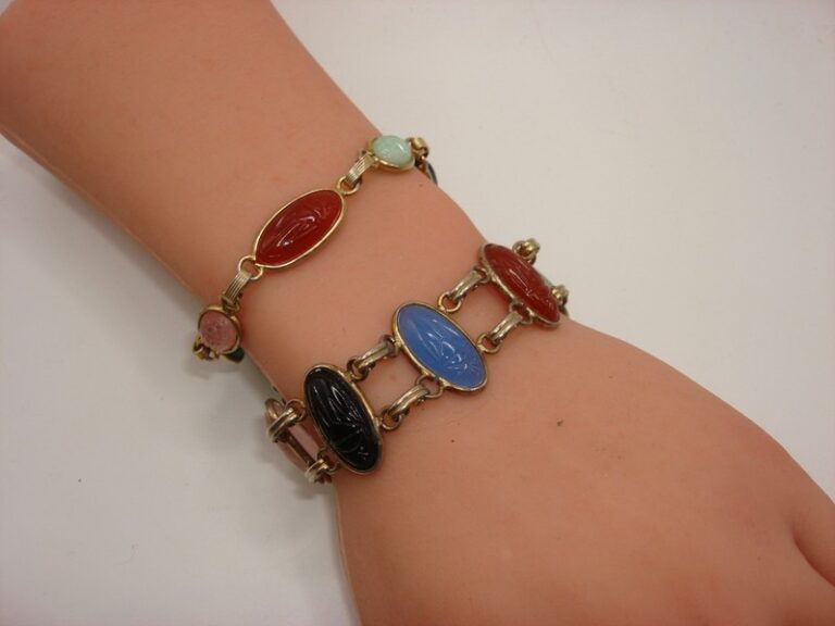 Set of two vintage 1960s molded glass scarab bracelets