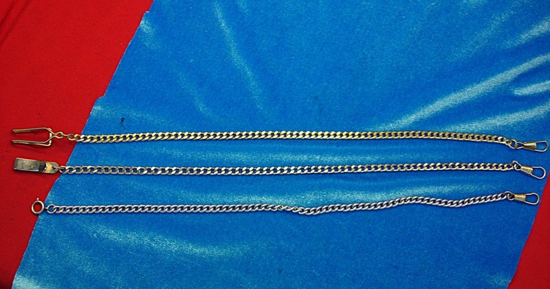 Set of three vintage gold and silver tone watch chains