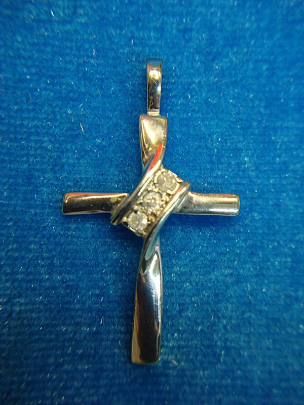 Sterling silver cross pendant with three simulated diamonds