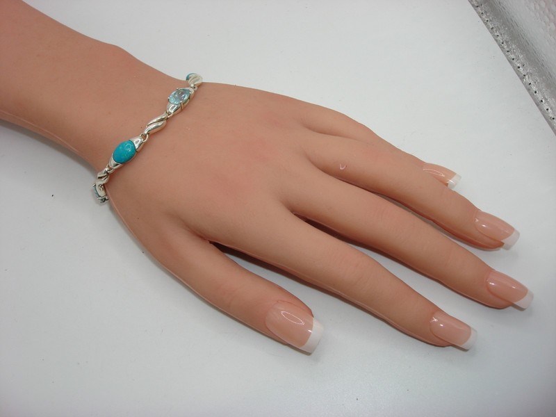 Sterling silver bracelet with blue topaz and Sleeping Beauty turquoise gemstones