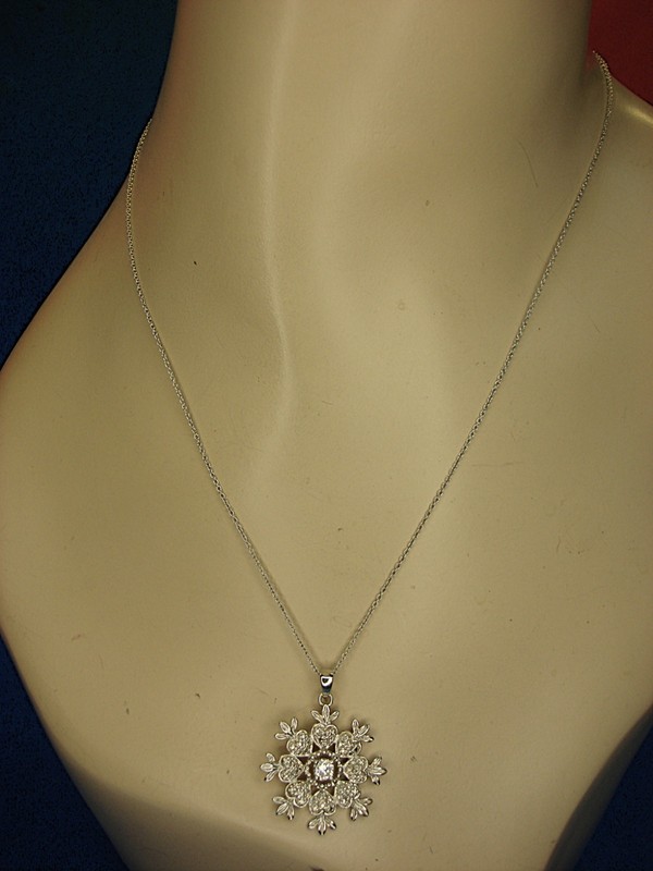 Sterling silver snowflake pendant necklace with cubic zirconia