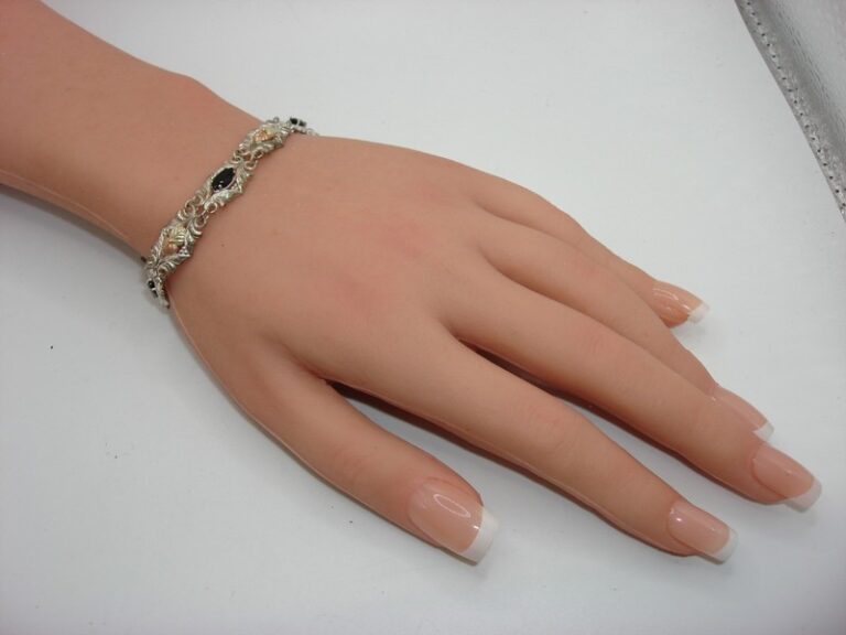 Vintage Coleman & Co. Sterling Silver, Gold, and Onyx Bracelet