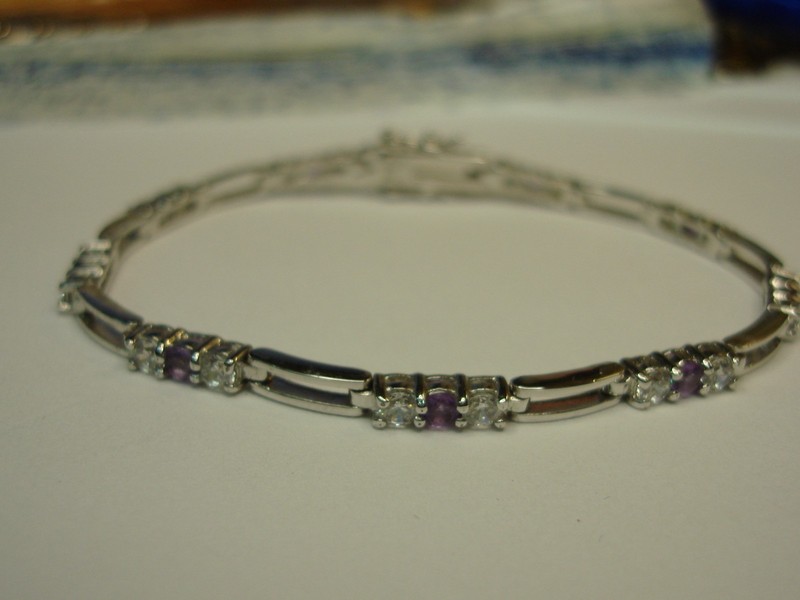 Sterling silver tennis bracelet with tanzanite and cubic zirconia stones