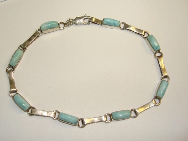 Vintage sterling silver bracelet with eight polished larimar cabochons
