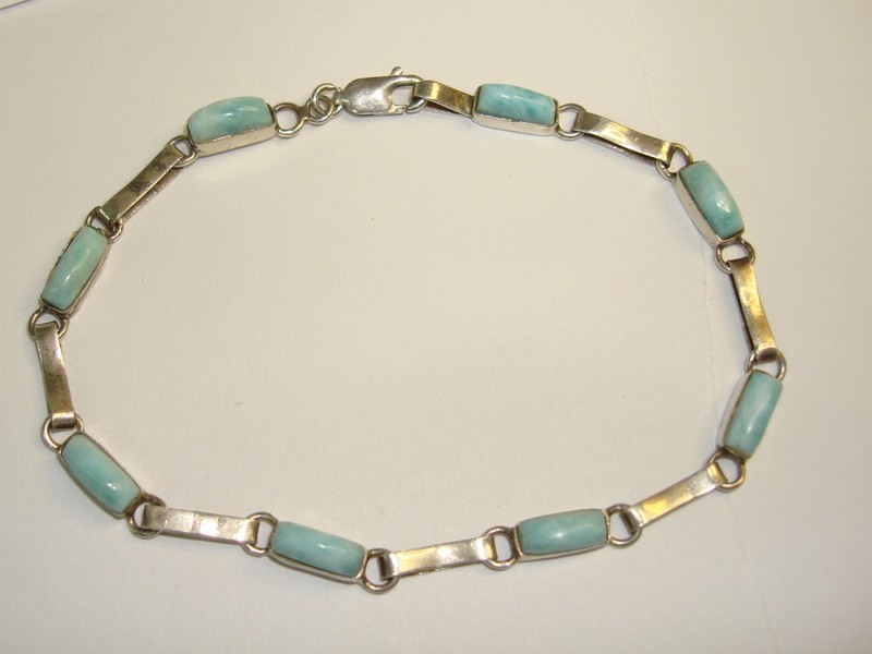 Vintage sterling silver bracelet with eight polished larimar cabochons