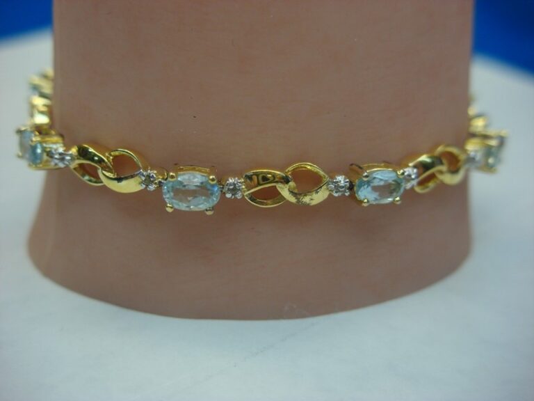 Sterling silver and gold vermeil bracelet with blue topaz gemstones