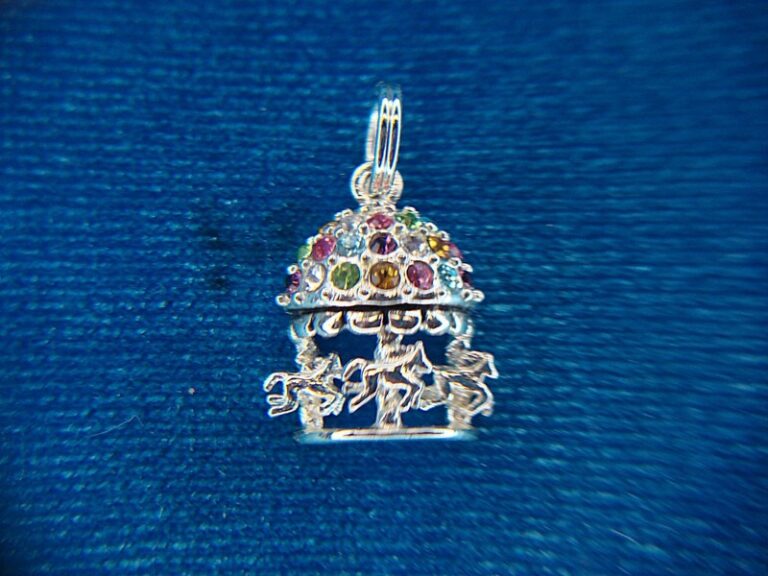 Vintage sterling silver carousel charm with colorful stones