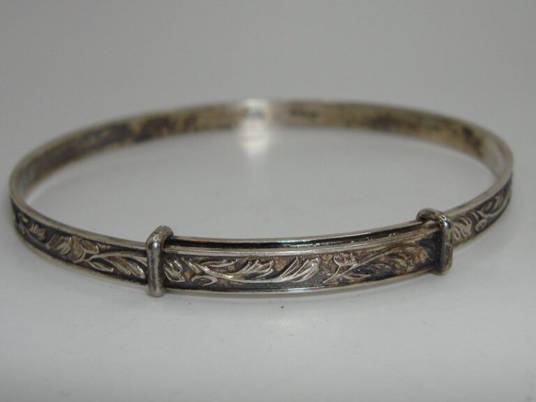 Vintage Art Nouveau silver bangle bracelet with floral design
