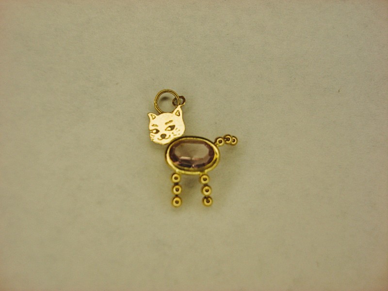 14K yellow gold kitten charm with moving tail and legs, featuring a simulated amethyst gemstone