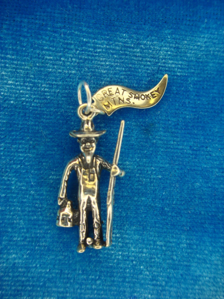 Vintage sterling silver Smoky Mountain Man charm with shotgun and jug