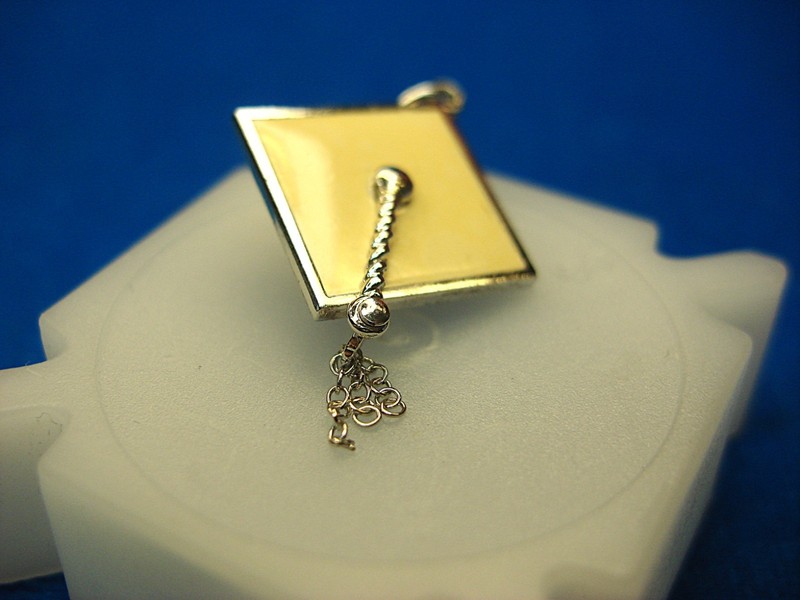 Sterling silver graduation cap charm with tassel and cream enamel