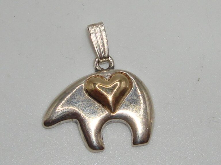 Genuine Navajo Zuni bear pendant in sterling silver and 14k gold
