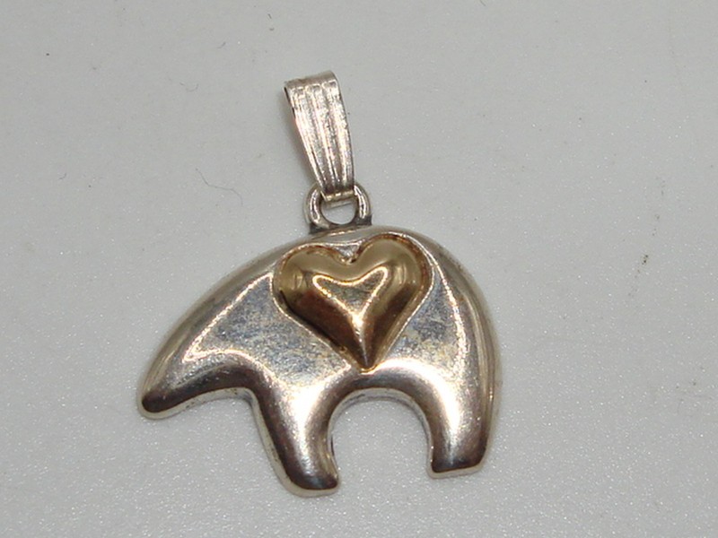 Genuine Navajo Zuni bear pendant in sterling silver and 14k gold