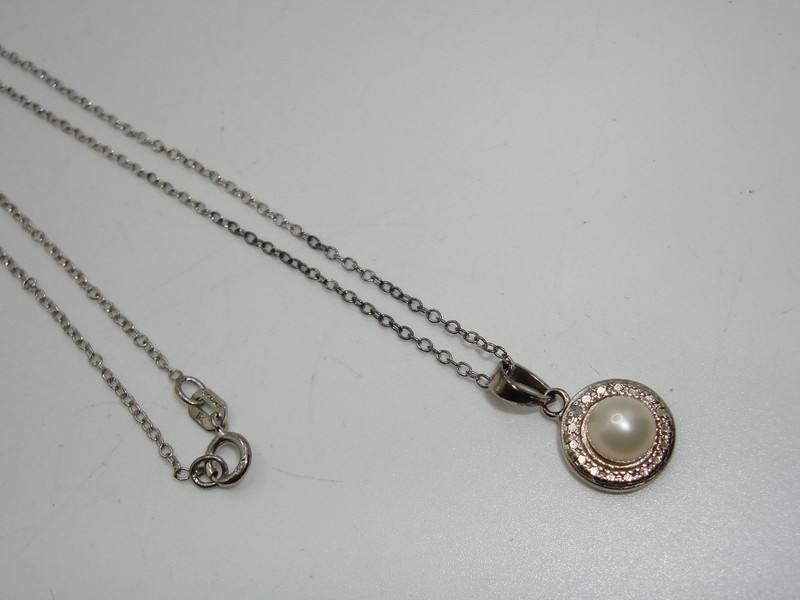 Sterling silver freshwater pearl and diamond pendant necklace