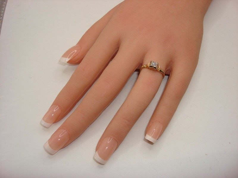Antique Art Deco ring in 14K and 18K gold with a 10-point diamond
