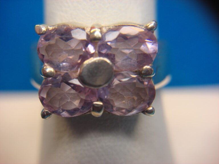 Sterling silver ring with four amethyst gemstones
