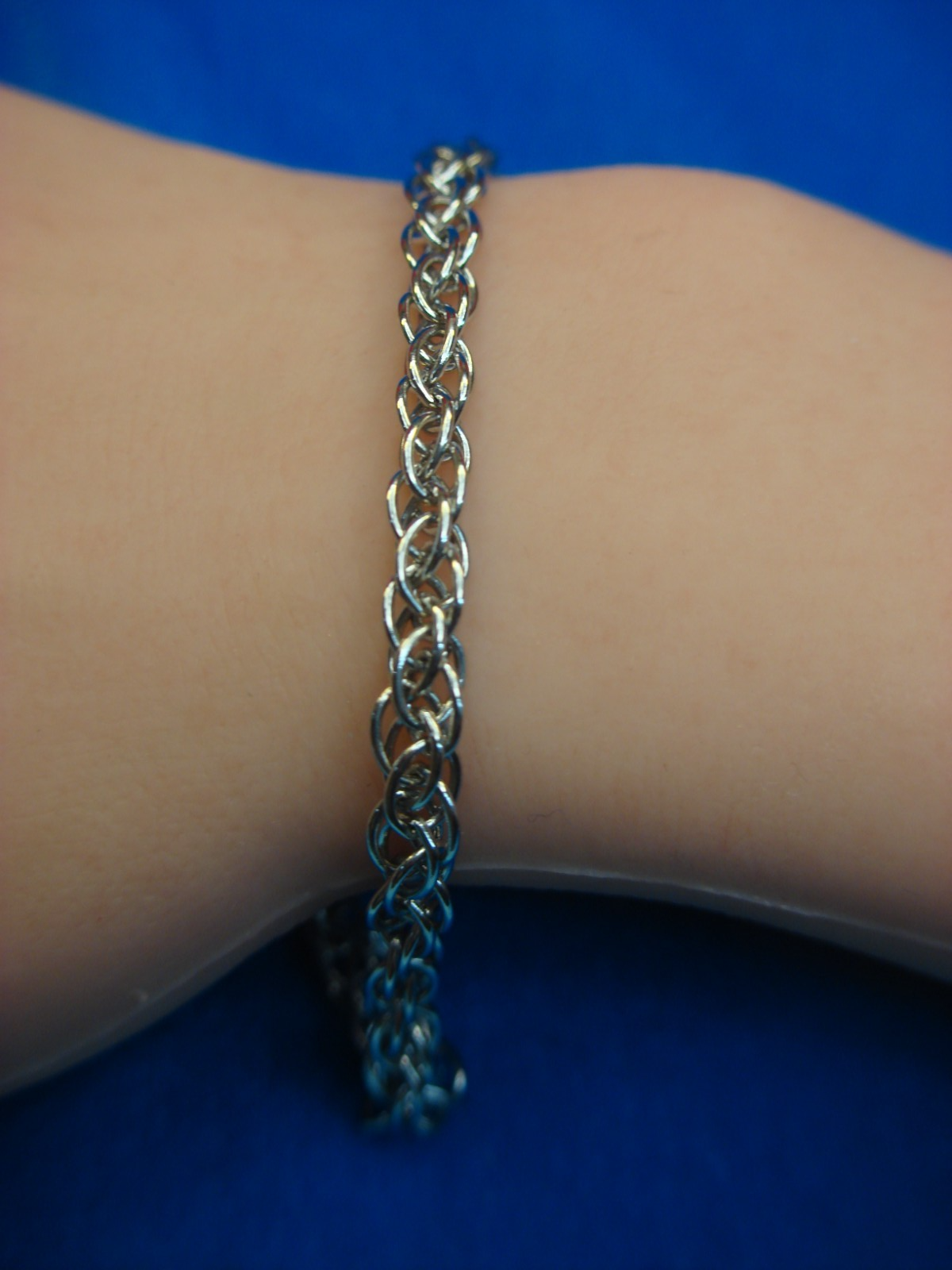 Sterling silver braided link bracelet, pre-owned unworn condition, 7.5 inches