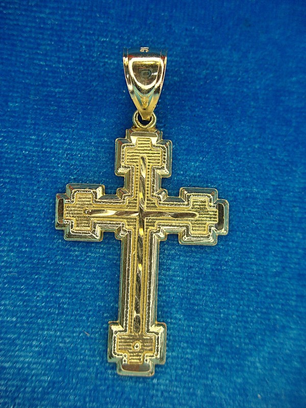 10K yellow gold cross pendant with diamond cut design