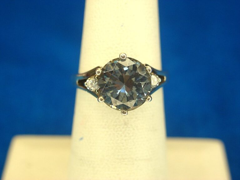 Sterling silver ring with blue topaz and cubic zirconia stones, size 6