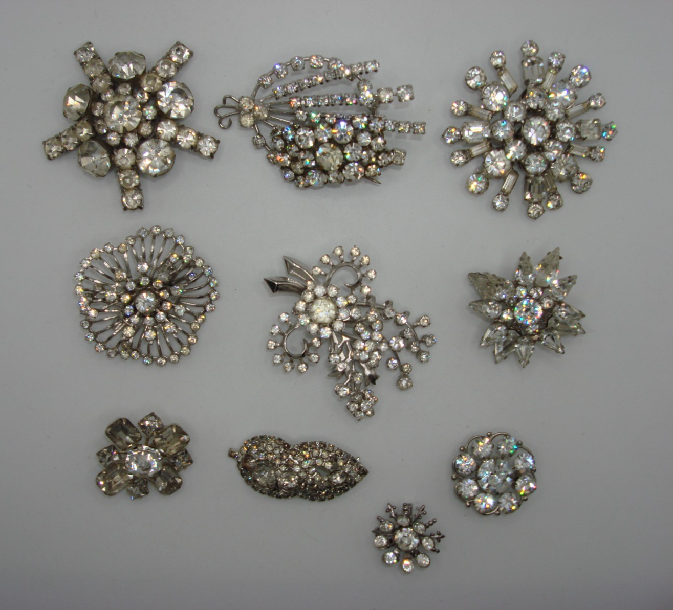 Lot of 10 vintage silver tone rhinestone brooches, 1950s-60s