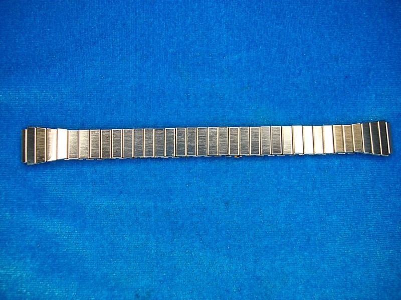 Vintage gold-tone stretch watch band, unused, wide design (12mm)