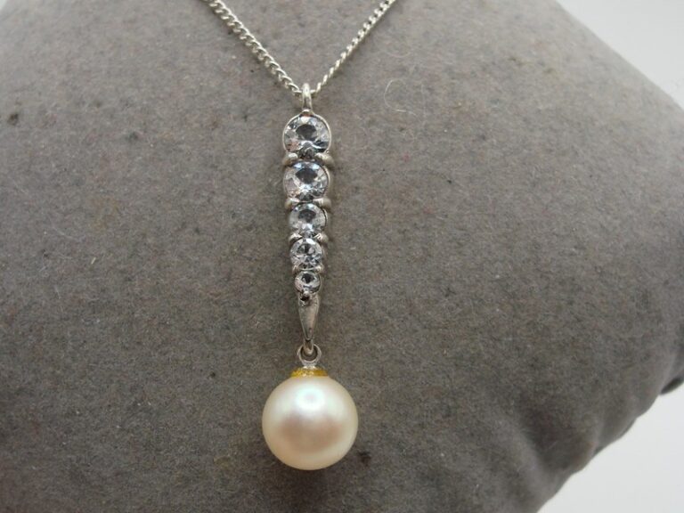 Vintage sterling silver pendant necklace with freshwater pearl and cubic zirconia stones