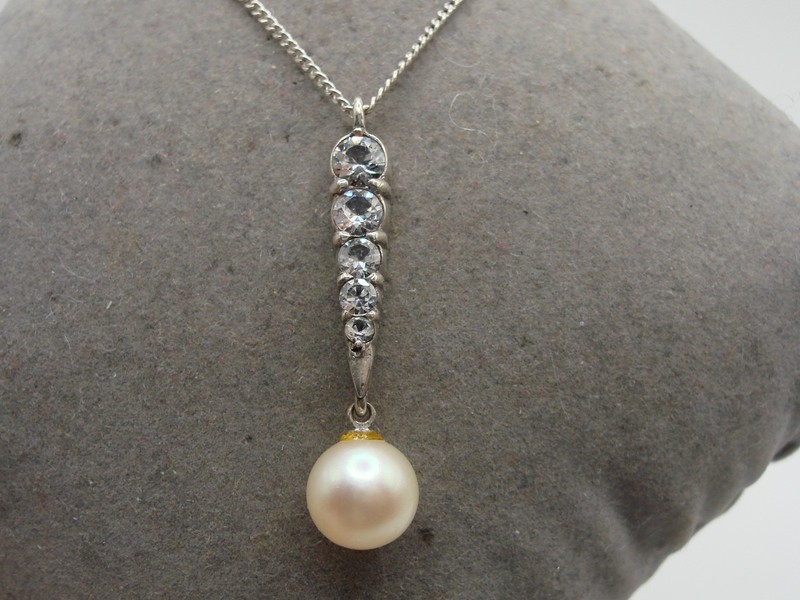 Vintage sterling silver pendant necklace with freshwater pearl and cubic zirconia stones