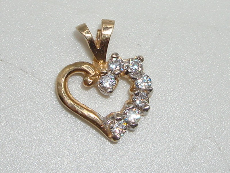 10K gold petite heart pendant with CZ stones
