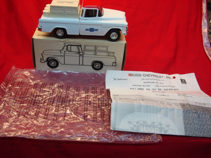 ERTL 1955 Chevrolet Pickup Truck model, white with red roof