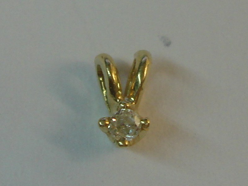 14K gold solitaire diamond pendant with a 2 carat brilliant sparkle