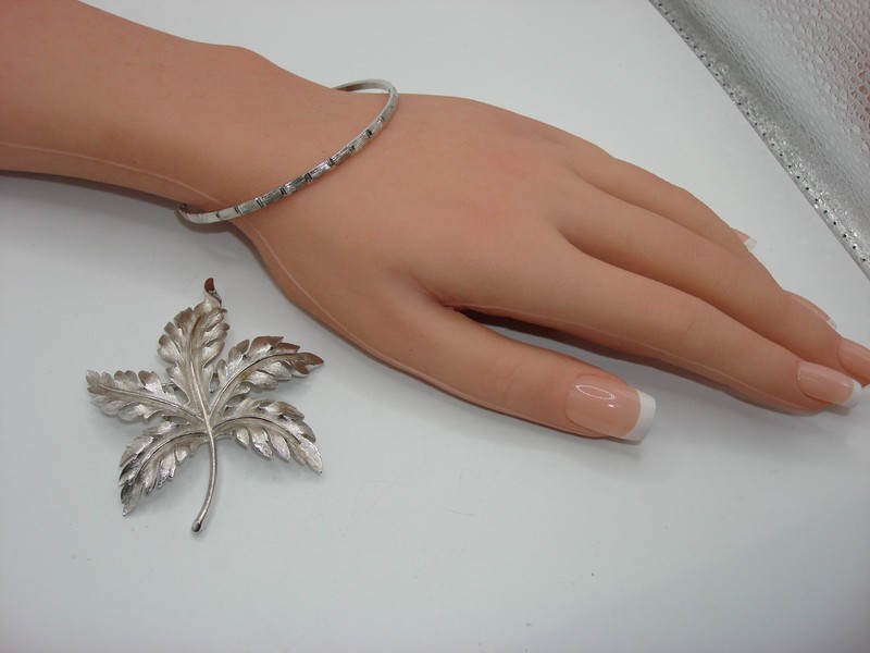 Vintage Crown Trifari bamboo bangle bracelet and leaf brooch set in silver