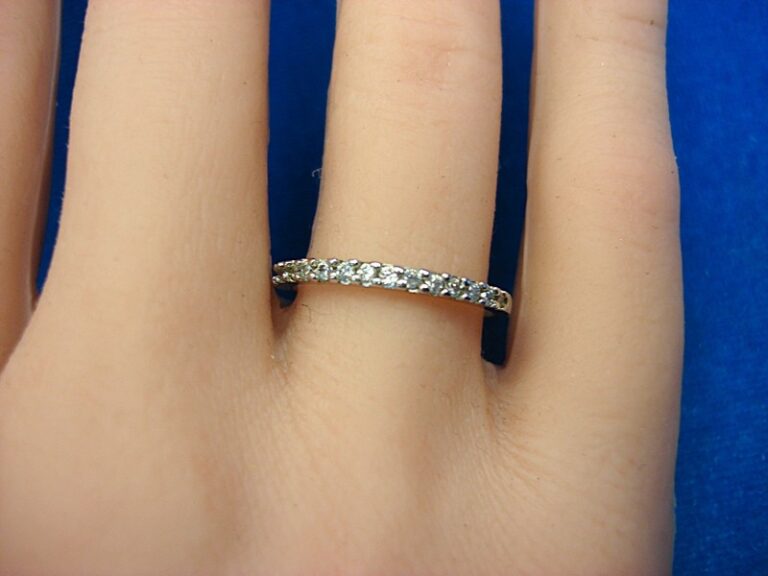 Sterling silver band ring with cubic zirconia stones, size 7
