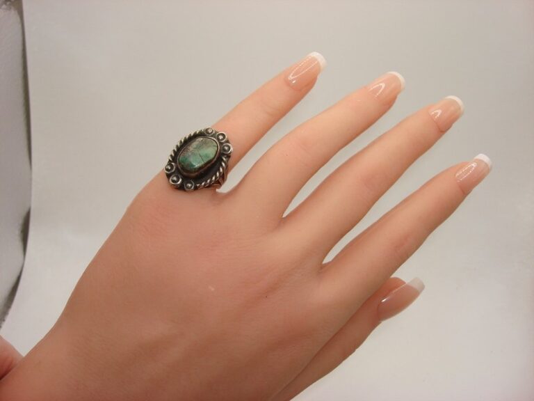 Vintage Native American sterling silver turquoise ring, size 4.5 with rope scroll and beaded drops
