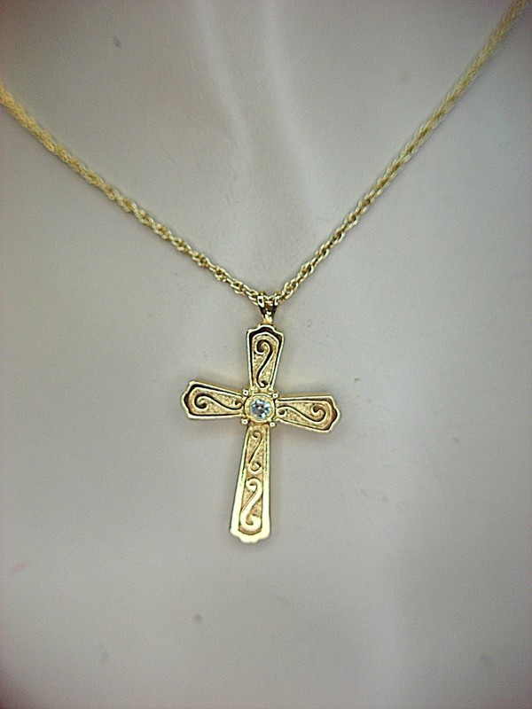 Gold tone cross pendant necklace with simulant diamond, 24 inch chain