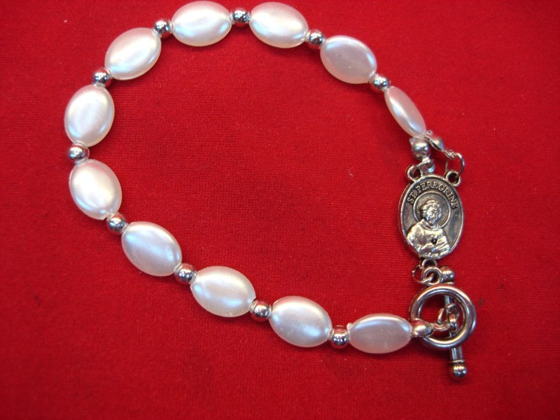 St. Peregrine bracelet with faux mother-of-pearl, featuring the patron saint of cancer.