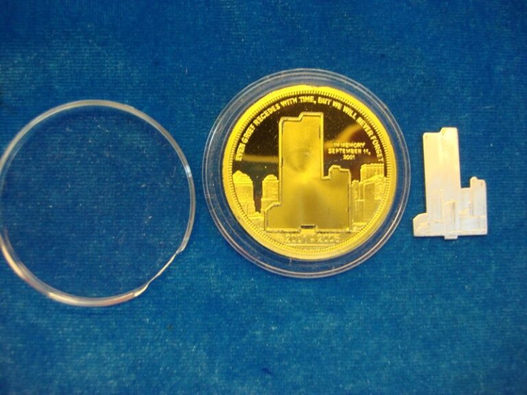 Gold-tone commemorative medallion honoring the 5th anniversary of the Twin Towers