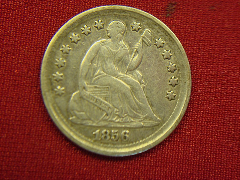1856 Seated Liberty Half Dime (Var 2, Stars Obverse) with natural patina and excellent detail.