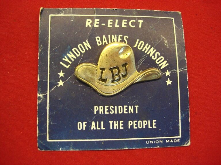 Vintage Lyndon B. Johnson 'Re-Elect' political pin with original card