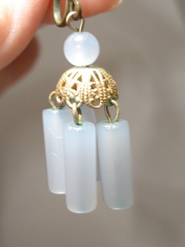 Art Deco brass filigree dangle earrings with blue glass tubes and moonstone.