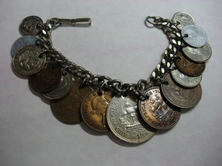 Vintage travel coin bracelet, 1950s-60s, featuring 15 international coins.