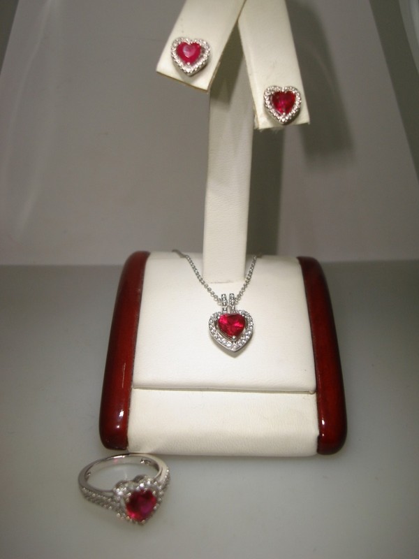 Sterling silver jewelry set with pink and clear topaz