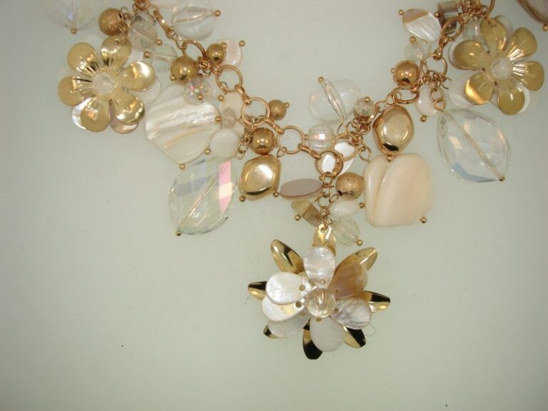 Gold-tone mother-of-pearl and crystal bib necklace