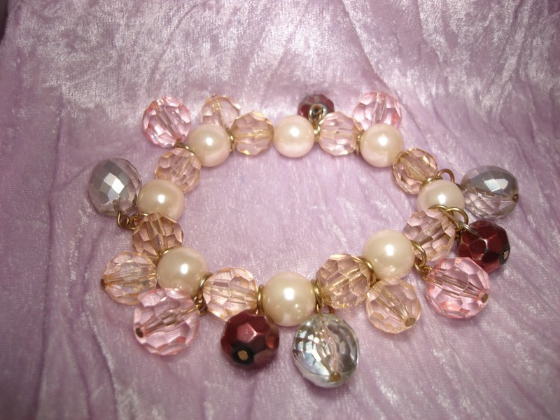 Felicia pink crystal and faux pearl stretch bracelet with aurora borealis and cranberry beads