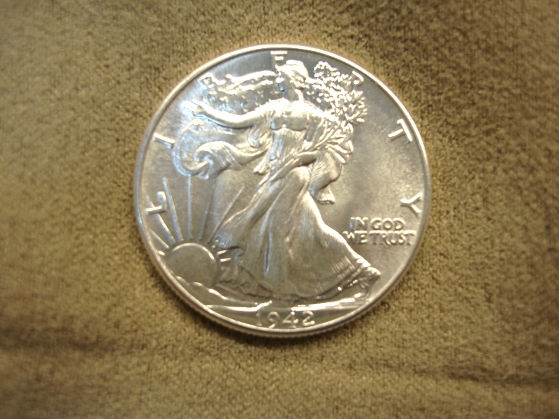 Genuine 1942 Walking Liberty Half Dollar with excellent detail and luster
