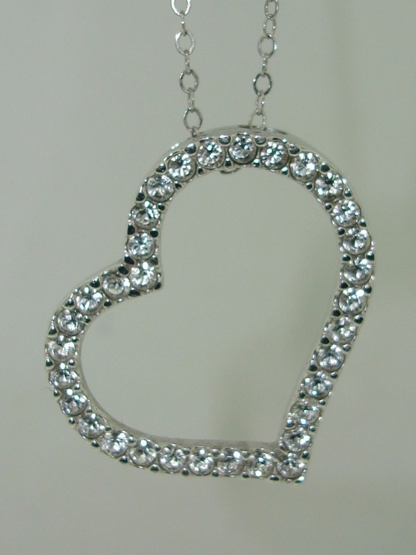 Sterling silver open heart pendant necklace with cubic zirconia stones