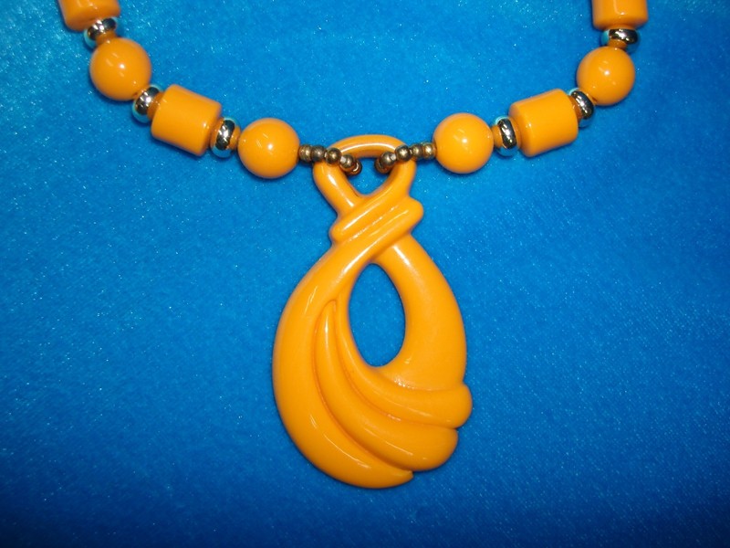 Vintage 1960s orange lucite pendant necklace with beads