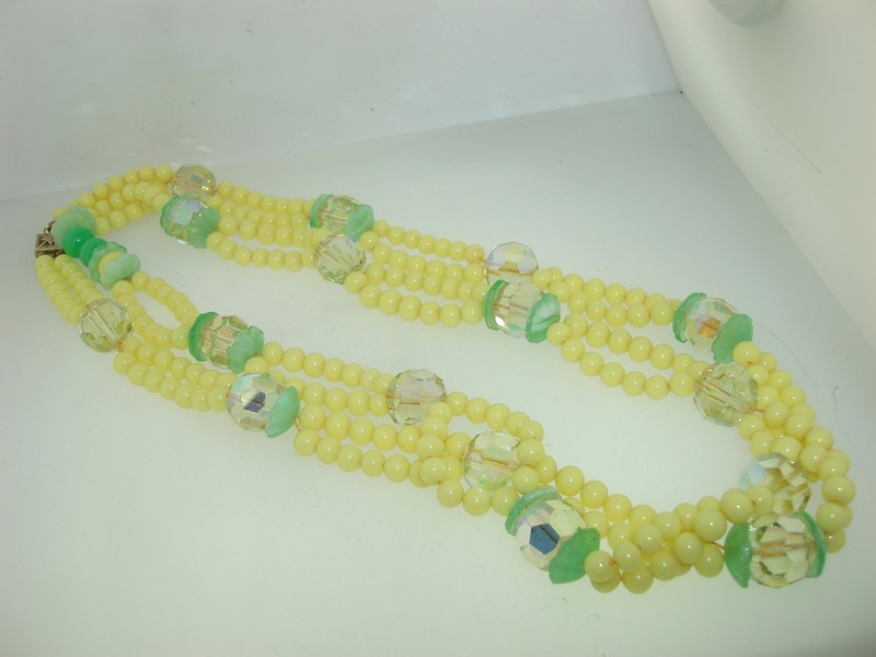 Vintage 1950s double strand glass bead necklace with AB beads and fluted caps