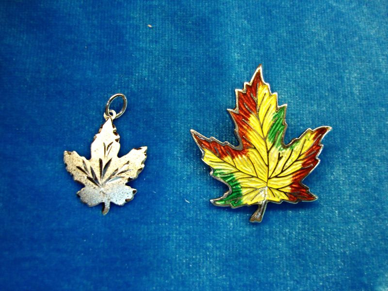 Sterling silver maple leaf pendant and pin set with enamel detailing