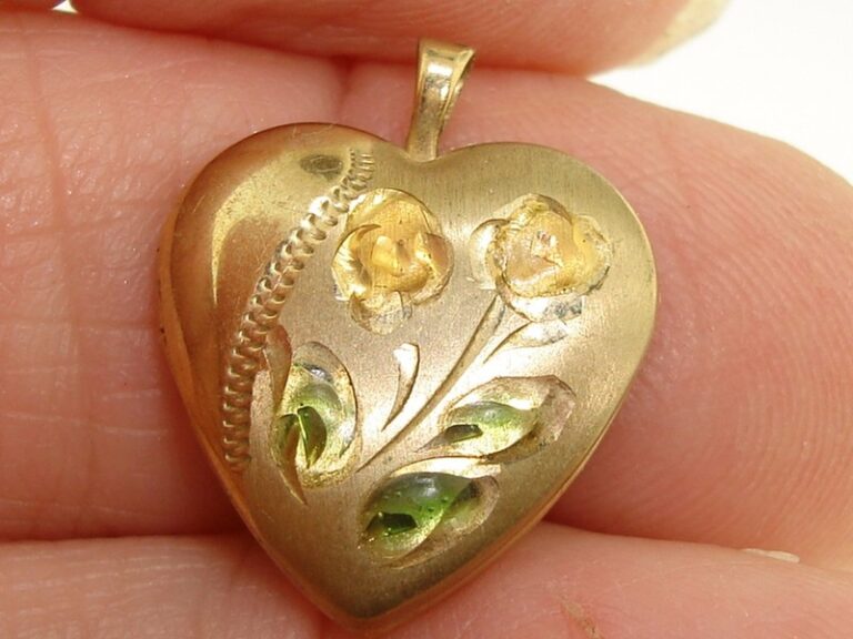 Vintage 14K gold-filled enamel floral locket with two picture compartments