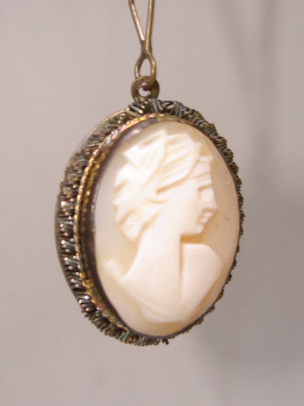 Edwardian cameo necklace with shell cameo and twisted silver trim, 1890s